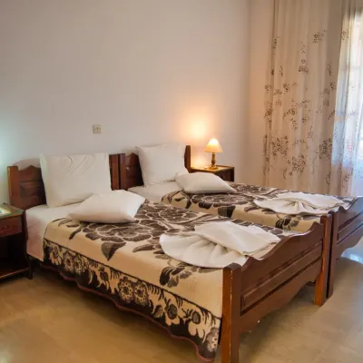 Twin beds in a bedroom of the standard two-bedroom apartment, Tria Adelphia, Arillas, Corfu